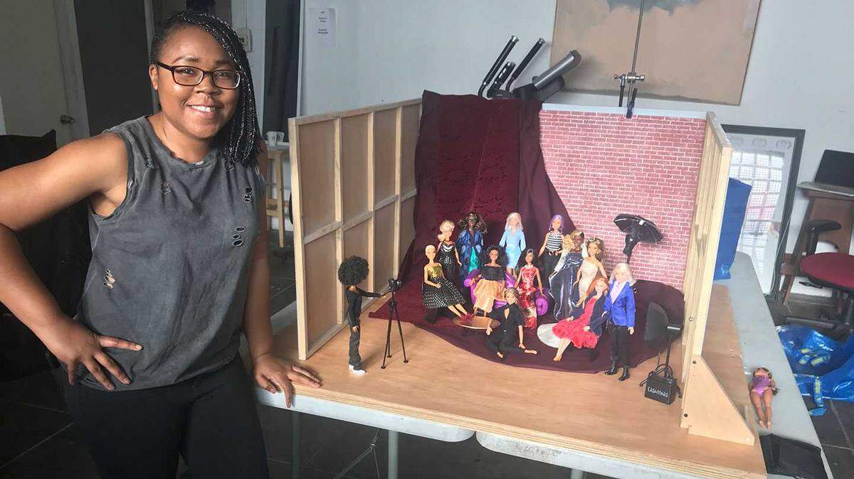 Director Lagueria Davis stands with a inclusive set of Barbie Dolls while making “Black Barbie: A Documentary,” which will be screened on the final night of the Oak Park Black Film Festival on Sunday, Oct. 15, 2023. Worldwide rights for the film recently were acquired by Shonda Rhimes’ Shondaland umbrella to bring the film to Netflix.
