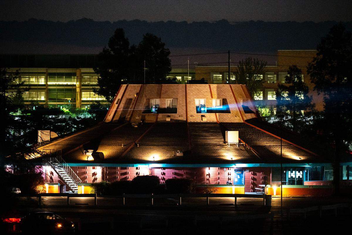 Movie projectors illuminate the screens at West Wind Drive-In on Thursday, March 19, 2020, hours before the ìshelter in placeî order in Sacramento County goes into effect in response to the coronavirus.