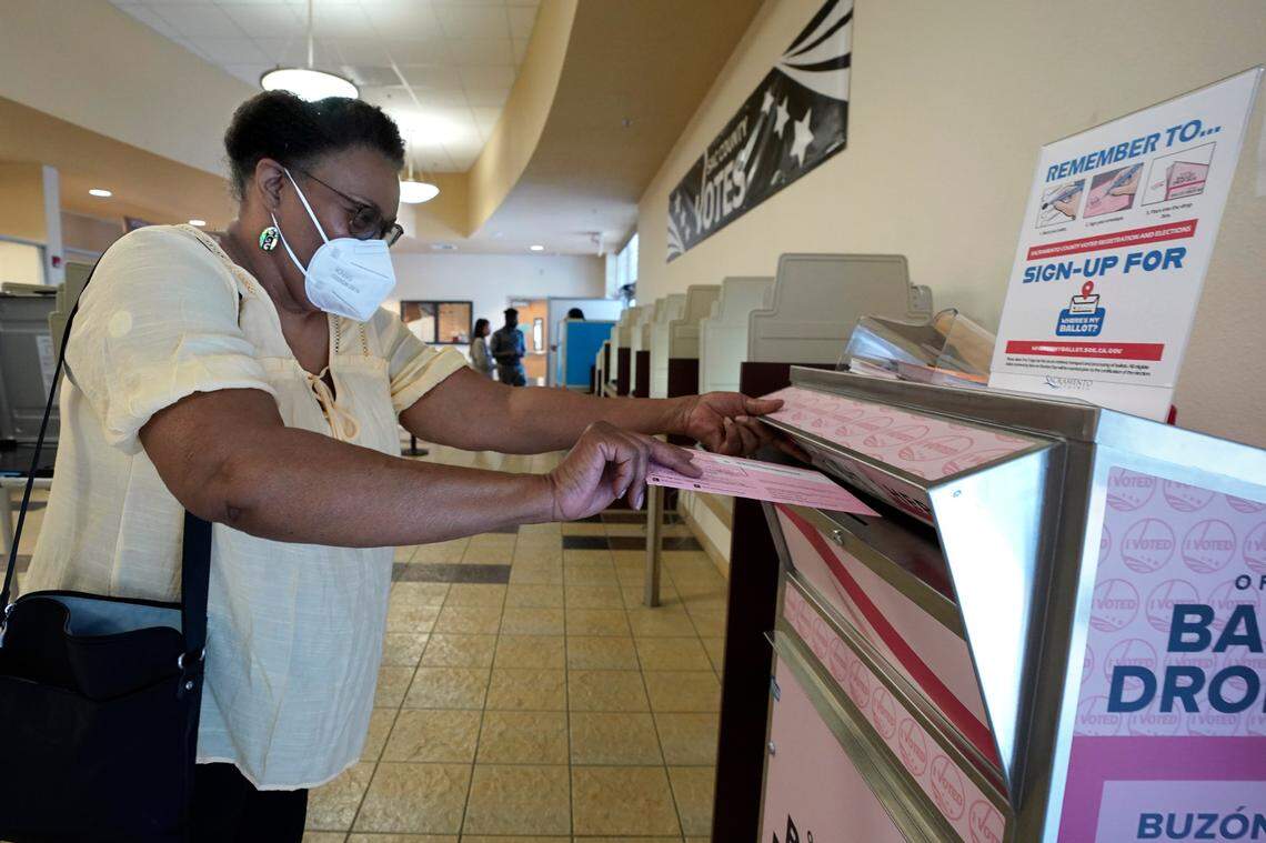 Cheryl Tyler casts her ballot at the Sacramento County Registrar of Voters in Sacramento on June 3.