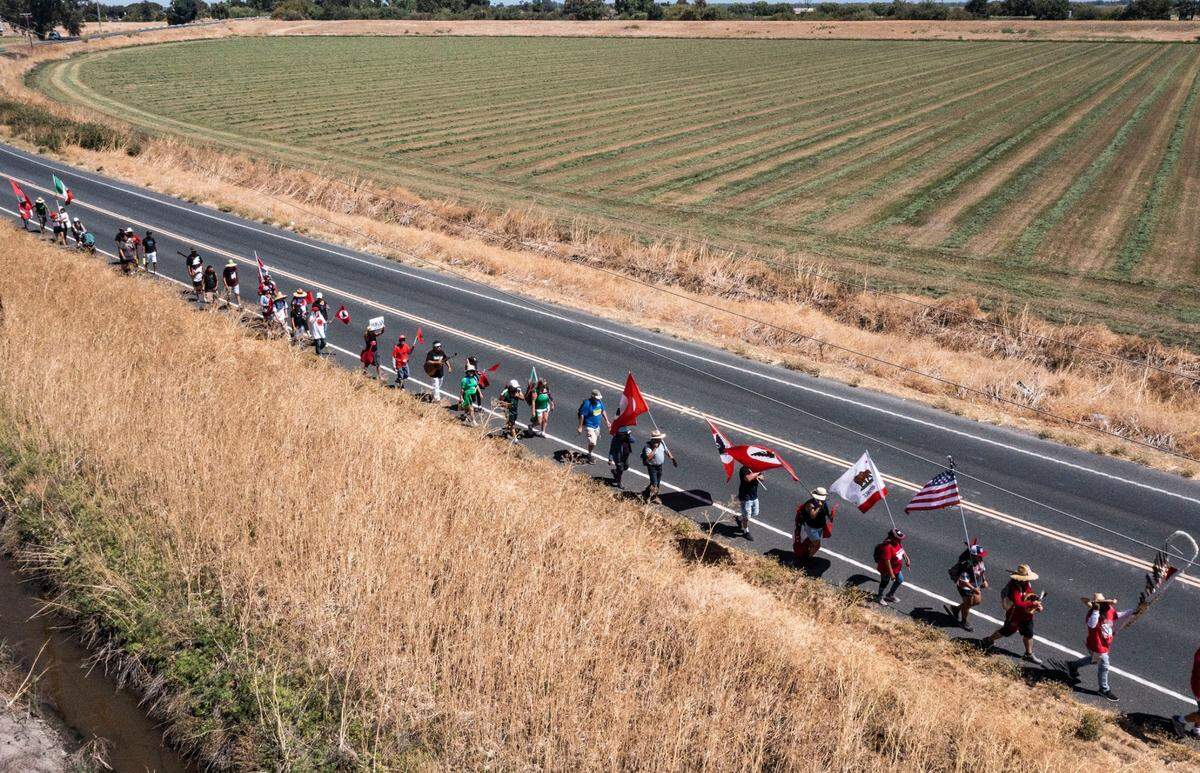 Supporters and members of the United Farm Workers Union march after making an overnight stop in Galt on Tuesday.