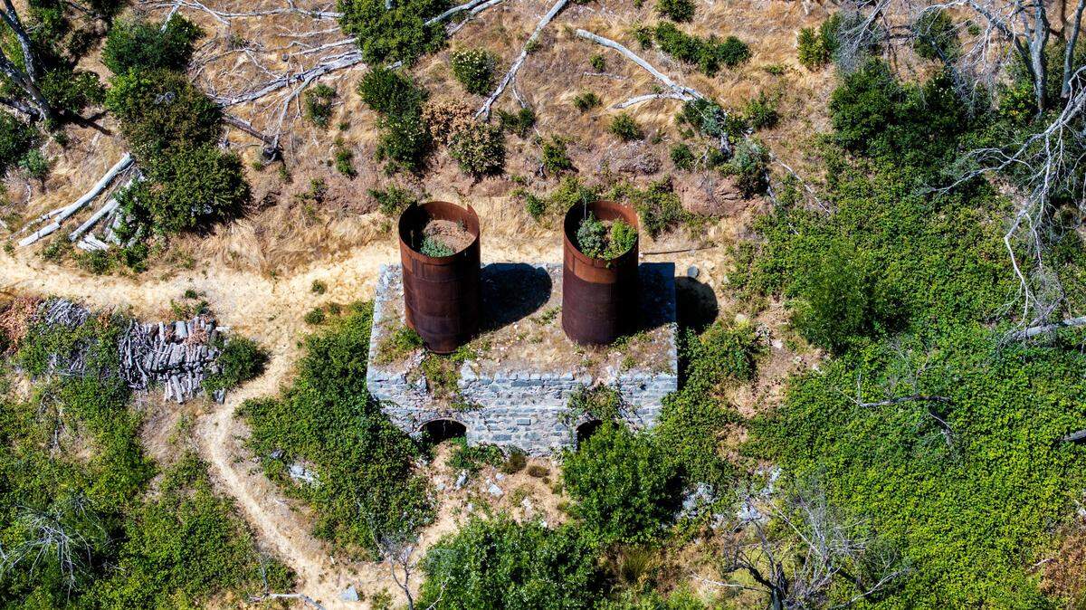 A historic lime kiln stands on a hillside Placer County last month. The site, on private land, was rediscovered after a wildfire in 2021.