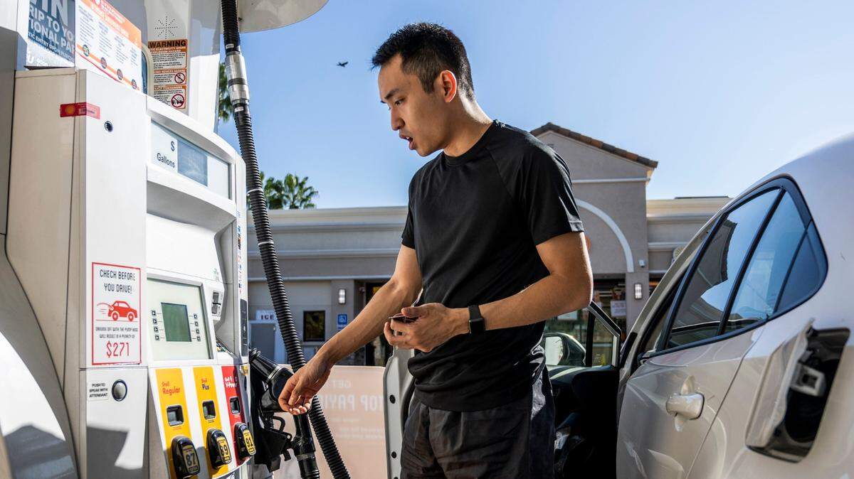 Natomas resident Jon Reyes reacts to the prices at the gas pump on the Shell station on Del Paso Road and Natomas Boulevard on Monday, Oct. 3, 2022, where a gallon of unleaded was $6.69.