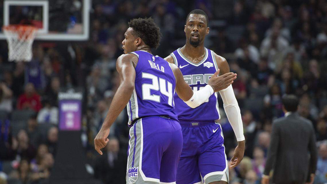 Sacramento Kings guard Buddy Hield (24) taps teammate Harrison Barnes (40) on the chest after an assist in the first quarter in Friday nights NBA basketball game between the Sacramento Kings and Miami Heat on February 8, 2019 at the Golden 1 Center in Sacramento.
