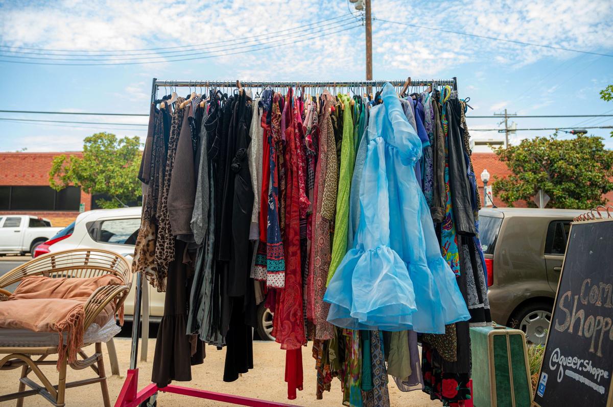 A color coded clothing rack of vintage items sits outside of QueerShoppe in Sacramento earlier this month.