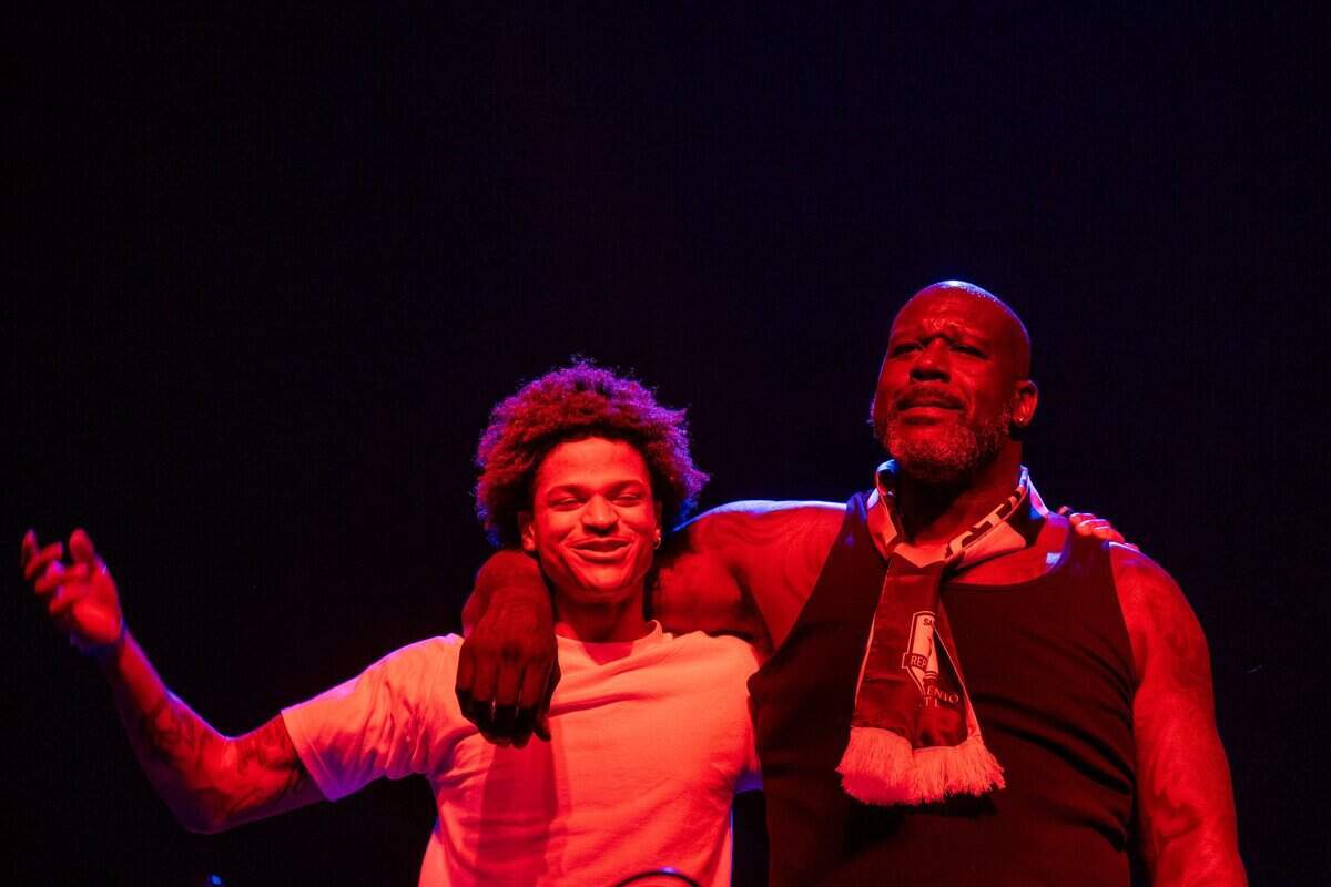 Shaquille O’Neal, aka DJ Diesel, embraces his son Shaqir O’Neal during the Shaq’s Bass All Stars performance at Heart Health Park in Sacramento on Friday. Shaqir will play for the Sacramento State basketball team this season.