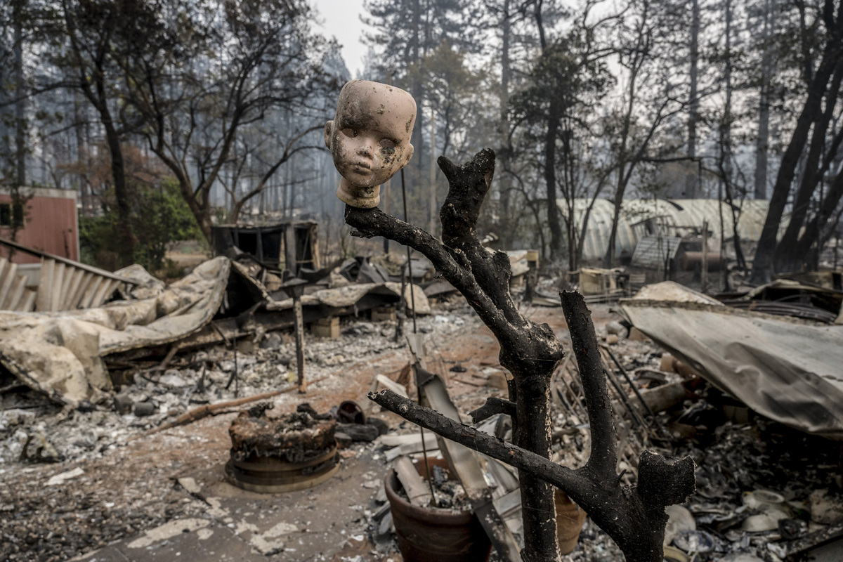 Charred remains of a home sit in Paradise, California, on Nov. 15, 2018, after the Camp Fire burned through the city. Cuts to the National Weather Service in 2025 have led to severely understaffed offices in the state, where meteorologists help forecast fire conditions.