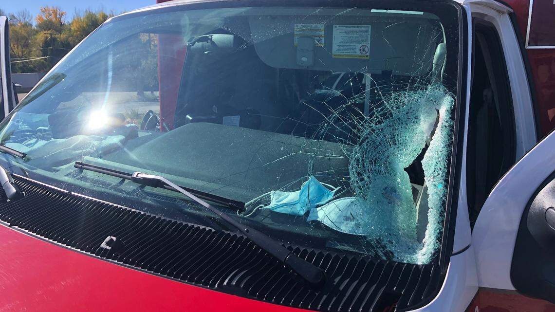 A 2-foot-by-4-foot piece of plywood flew from the bed of a moving truck and smashed an ambulance’s windshield on Oct. 28, 2021, in Lakewood, Colorado, fire officials said. The driver had minor cuts from the glass.