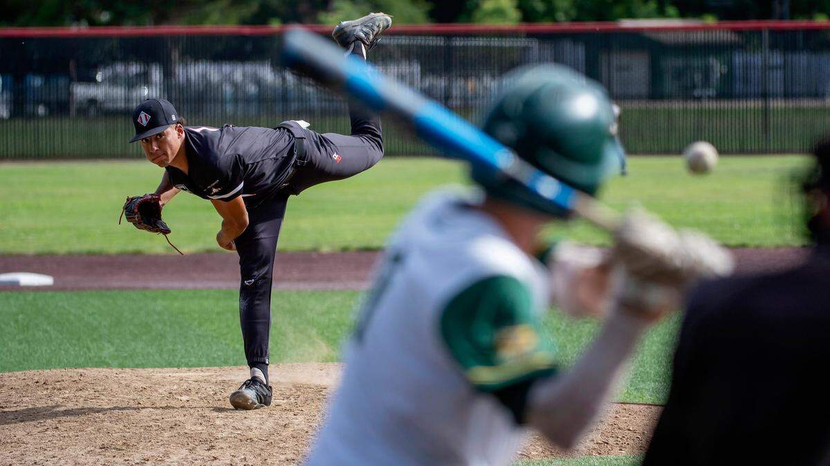 Alpha Charter Angels pitcher Jaxon Byrd pitches in the bottom of the third inning Thursday against Rio Americano at Jesuit High School in Carmichael.