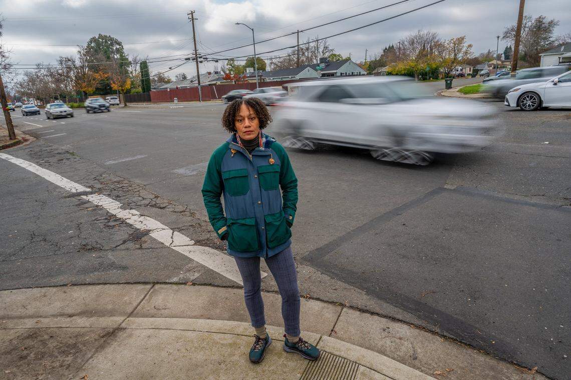 Kiara Reed, executive director of environmental design advocacy group Civic Thread, stands near where there used to be a crosswalk across Freeport Boulevard at Oregon Drive in Sacramento on Wednesday4. When Qui Chang Zhu, 72, crossed the street in the crosswalk in 2018 with her grandson Jian Hao Kuang, they were hit by a car. Zhu died, and her grandson sustained severe brain damage and will be disabled for the rest of his life.