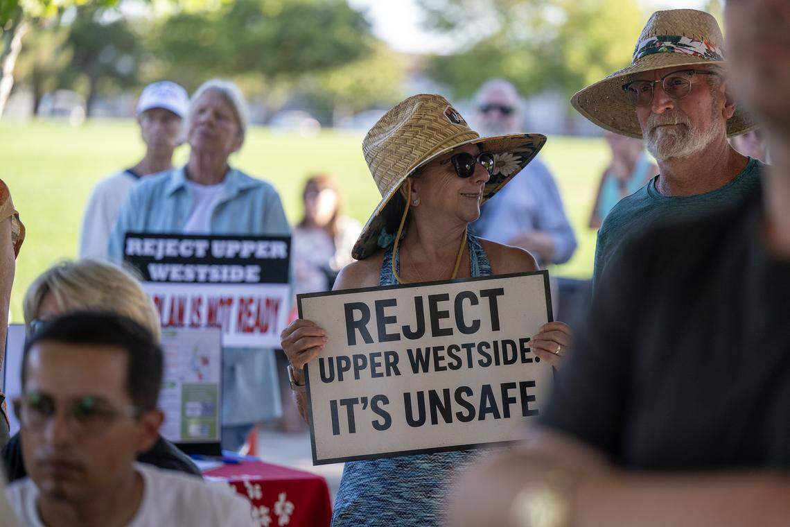 More than 100 Natomas-area residents and community leaders rally in opposition to the Upper Westside development on Tuesday, Aug. 19, 2025, at Westlake Community Park.