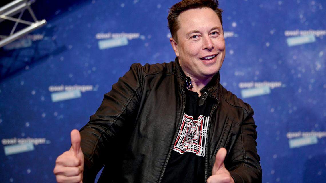 FILE - In this Tuesday, Dec. 1, 2020 file photo, SpaceX owner and Tesla CEO Elon Musk arrives on the red carpet for the Axel Springer media award, in Berlin, Germany.