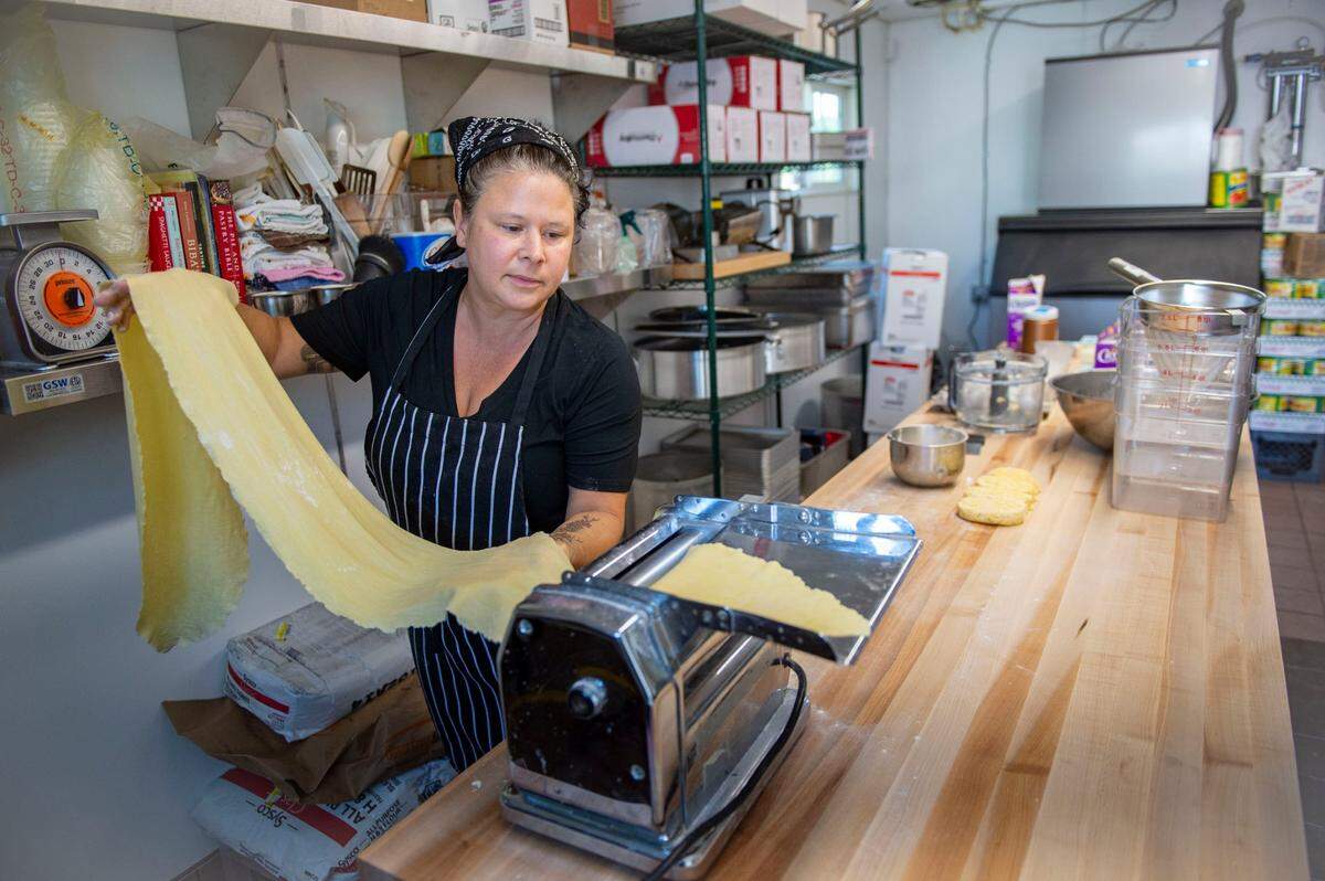 Penny Sheridan, Biba’s former pasta and pastry chef, rolls out a test batch of noodles Friday, May 7, 2021, as Mattone Ristorante prepares to open to the public. The new restaurant in East Sacramento will open May 18 in the Espanol Italian Restaurant space on Folsom Boulevard with several former staff members from Biba’s to continue on the legacy of their late chef Biba Caggiano.