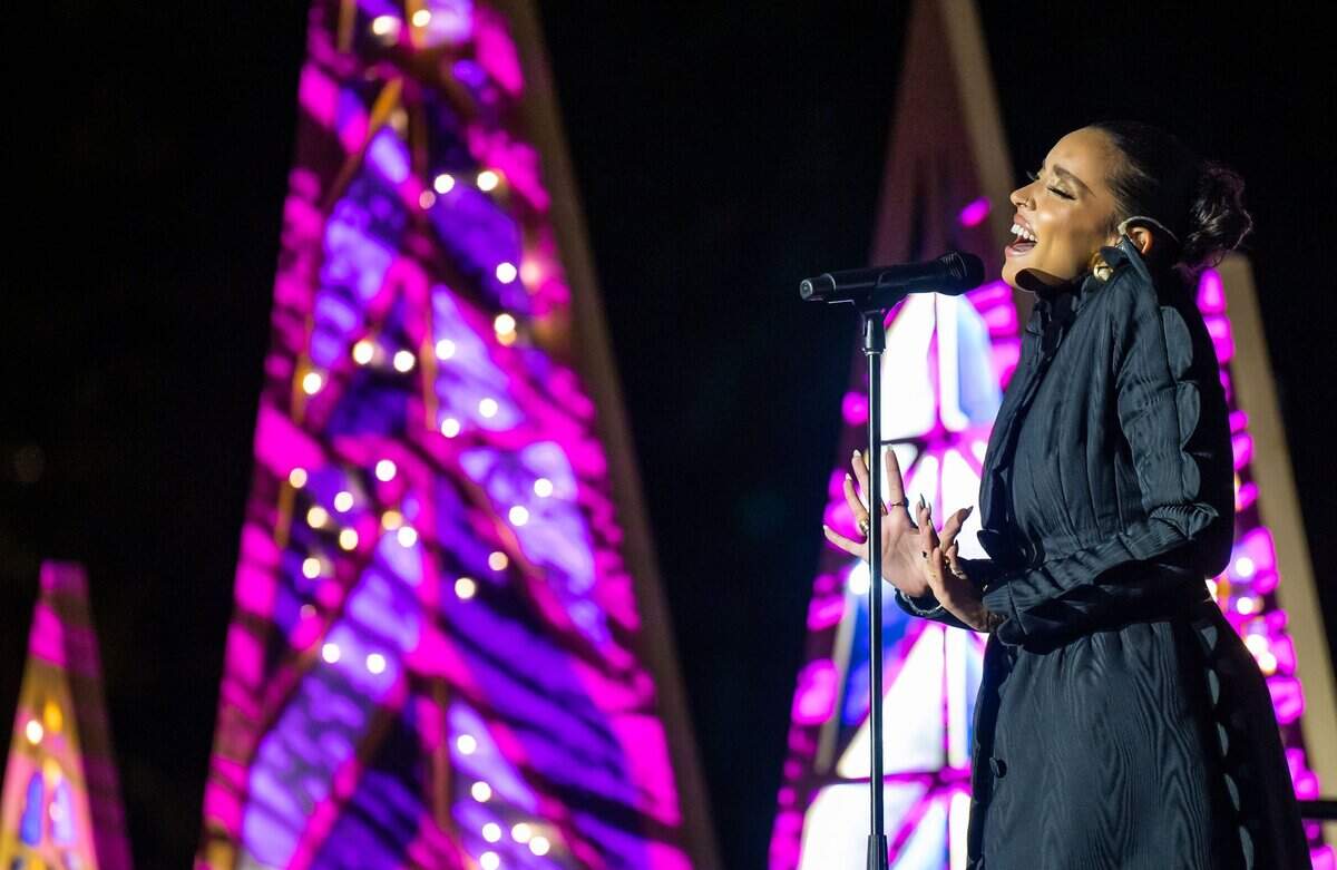 California music artist Tinashe sings during the 91st annual state Capitol tree lighting ceremony on Thursday, Dec. 1, 2022. First Partner Jennifer Siebel Newsom introduced her to the stage after reading a Christmas story to children while incorporating the evening’s performers.