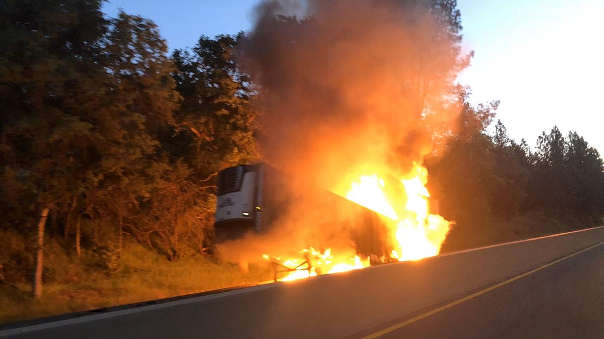 A truck trailer blazes near Exit 139 on westbound Interstate 80 Friday morning.