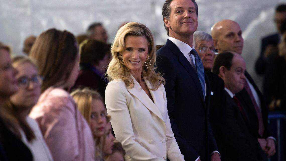Governor Gavin Newsom and First Partner Jennifer Siebel Newsom look around during the inauguration at the state Capitol on Monday, Jan. 7, 2019, in Sacramento.