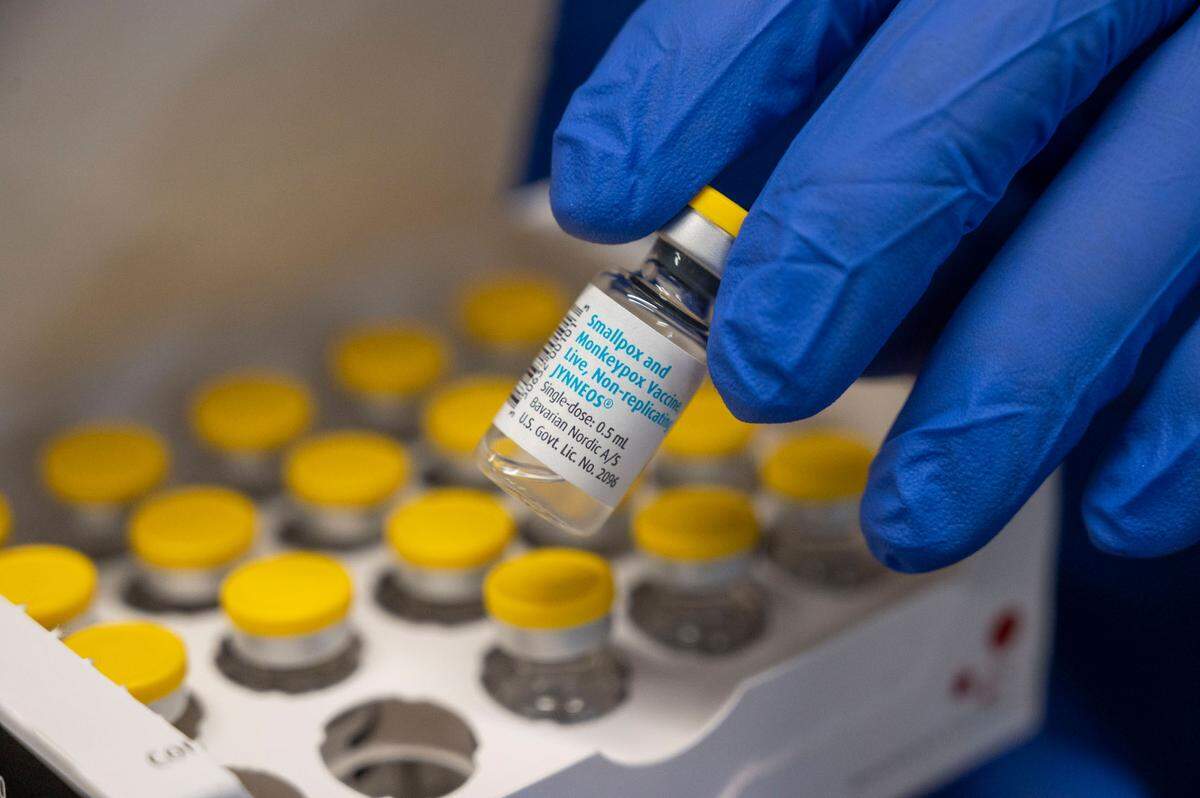 Pucci’s Pharmacy owner Clint Hopkins opens a box of monkeypox vaccines on Wednesday. He said they are one of the only pharmacies in the country that is offering monkeypox vaccinations because many pharmacies won’t participate due to lack of reimbursement.