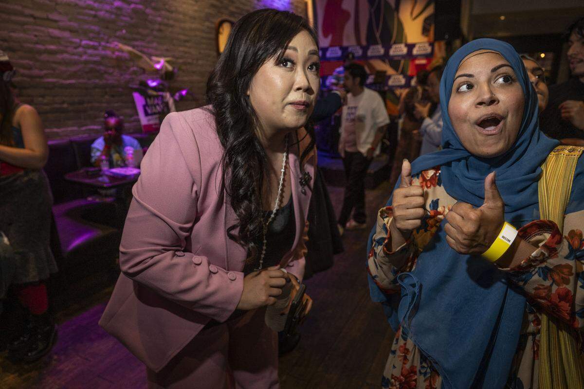 Sacramento City Councilmember Mai Vang, a candidate for the 7th Congressional District, speaks to supporter Sumayya Jawadi during her election night party at The Lock & Key in midtown Sacramento on Tuesday, June 2, 2026.