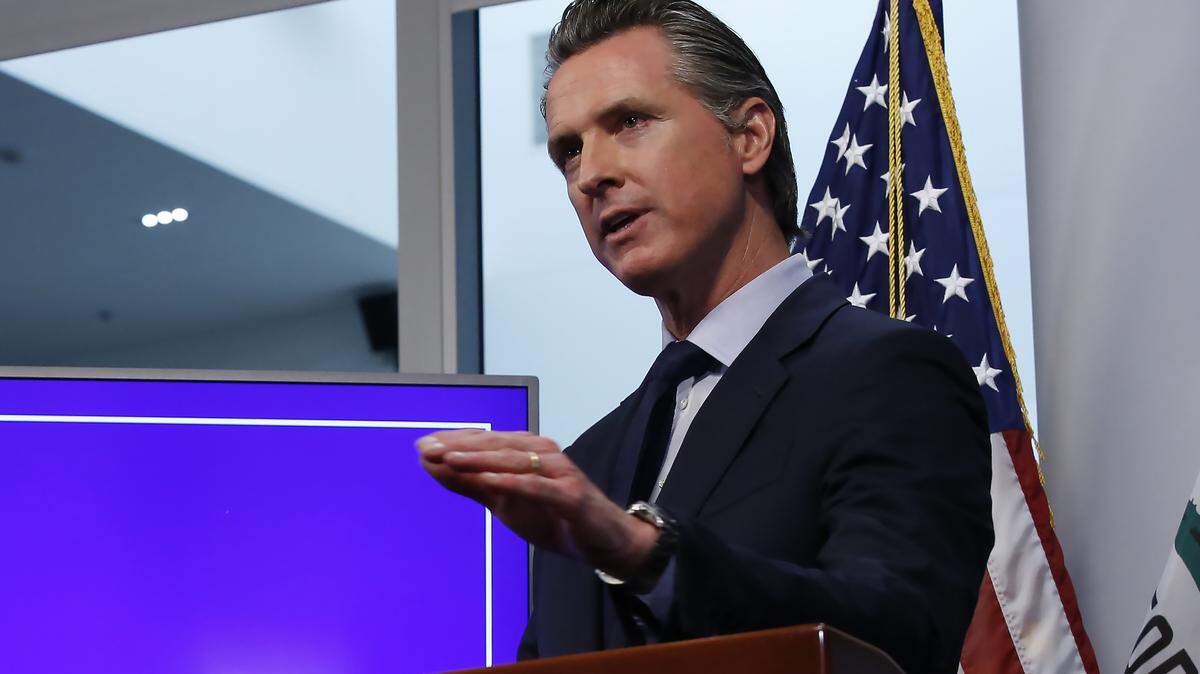 FILE— In this Tuesday April 14, 2020, file photo, California Gov. Gavin Newsom discusses an outline for what it will take to lift coronavirus restrictions, during a news conference at the Governor’s Office of Emergency Services in Rancho Cordova, Calif. On Wednesday, April 22, Newson announced hospitals can resume scheduled surgeries. It’s the first significant change to the state’s stay-at-home order. (AP Photo/Rich Pedroncelli, File)