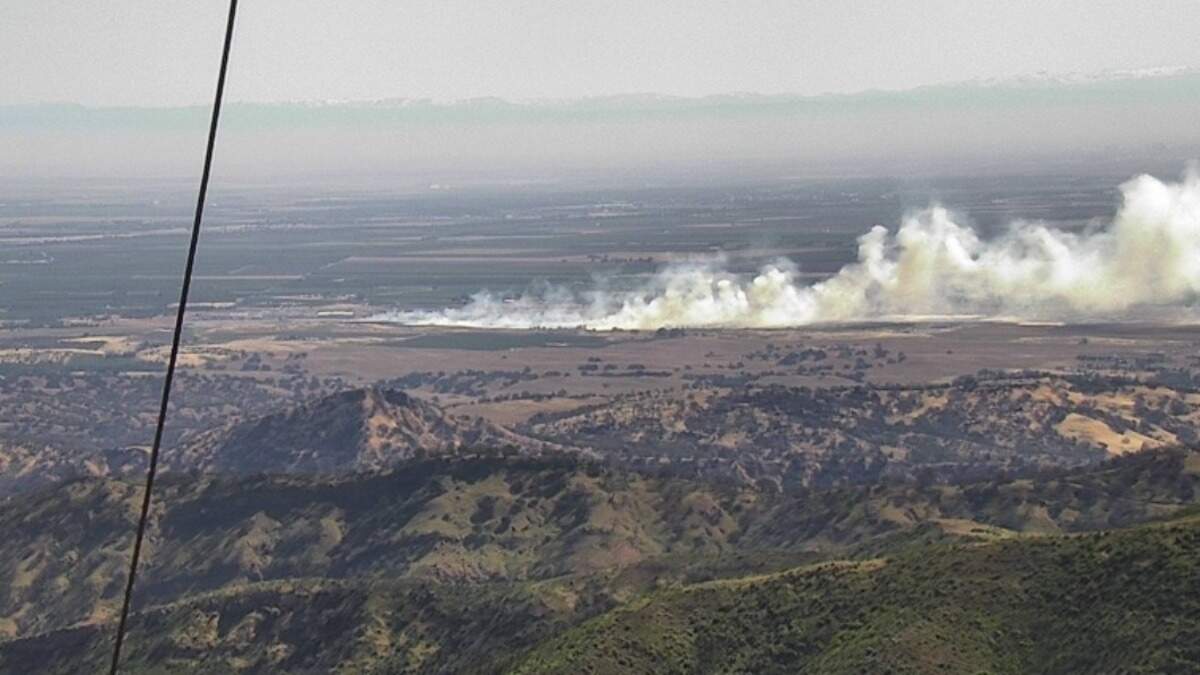 An approximately 25-acre grass fire burning south of Winters, California, on Tuesday, May 3, 2022, drew a three-alarm response. No evacuations were necessary, emergency officials said.