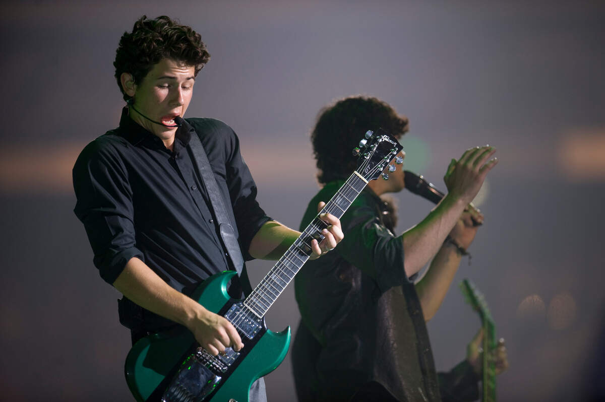 Nick Jonas and his brothers perform to the delight of thousands of young fans in 2009 during the Sacramento stop of the Jonas Brothers’ World Tour at Arco Arena.