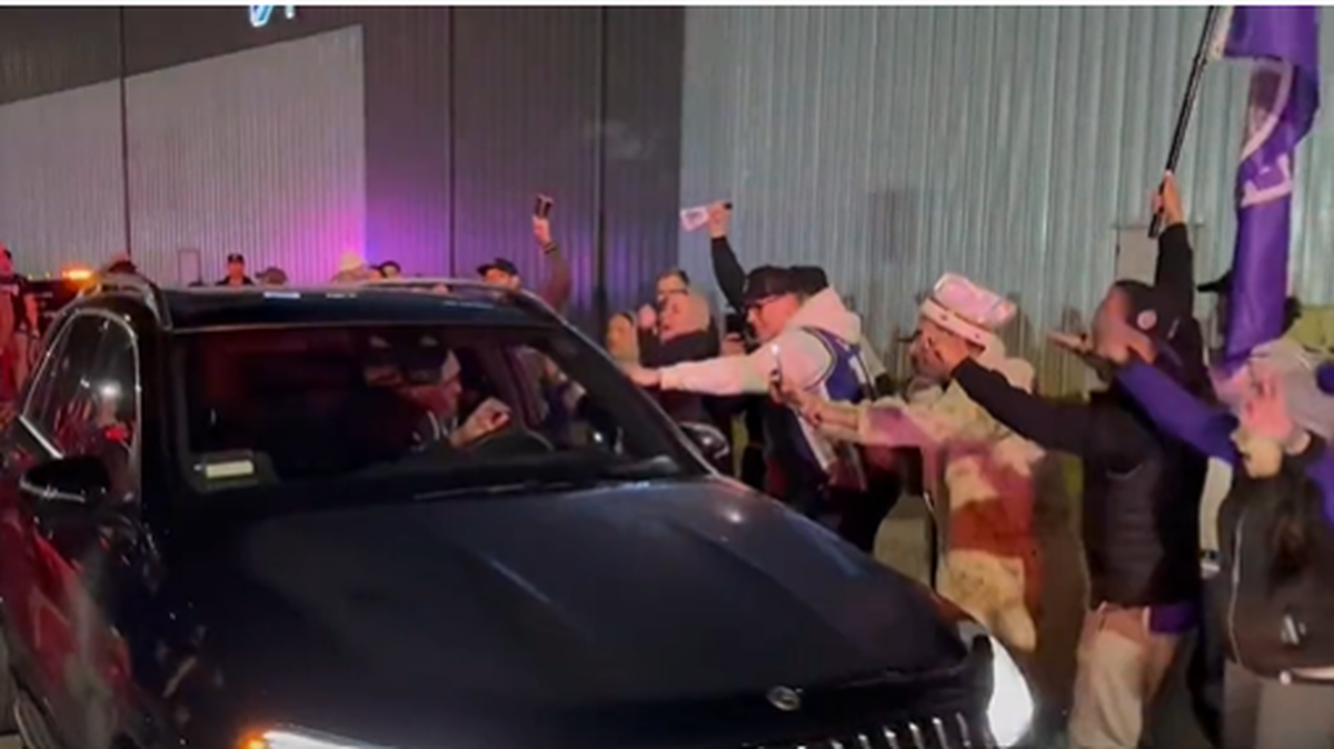 Kings coach Mike Brown returns from Portland to find hundreds of fans cheering the team’s arrival at Sacramento International Airport on April 1, 2023, after the Kings clinched their first playoff berth since 2006.
