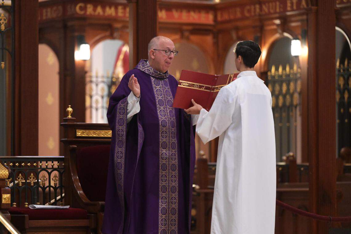 Michael Jackels, retired Archbishop of Dubuque. Iowa, performs the 8 a.m. Mass at the Cathedral of the Blessed Sacrament in downtown Sacramento on Sunday. At the end of the service, Jackels announced that the Sacramento Diocese would seek bankruptcy protection in the wake of hundreds of sexual abuse lawsuits.