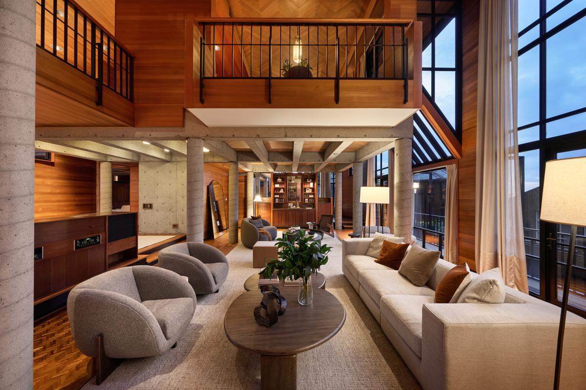 The home is defined by bold visionary architecture and thoughtful use of materials, boasting open volumes, floating mezzanines, floor-to-ceiling windows and artisan touches throughout.