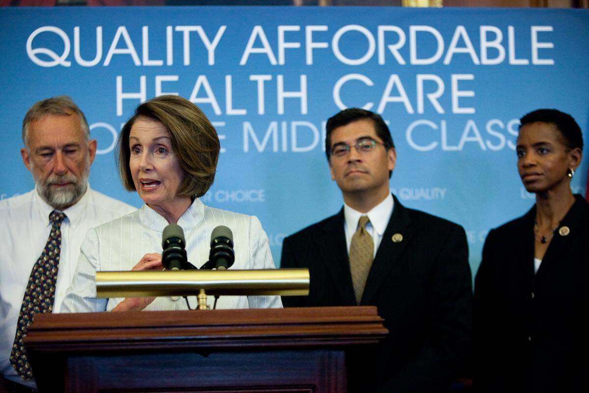 House Speaker Nancy Pelosi, D-Calif., speaks at a news conference on health care reform with House Democrats and patients affected by a lack of health care on July 22, 2009, in Washington, DC. Speaker Pelosi is pushing for the House to pass the Affordable Care Act before August.