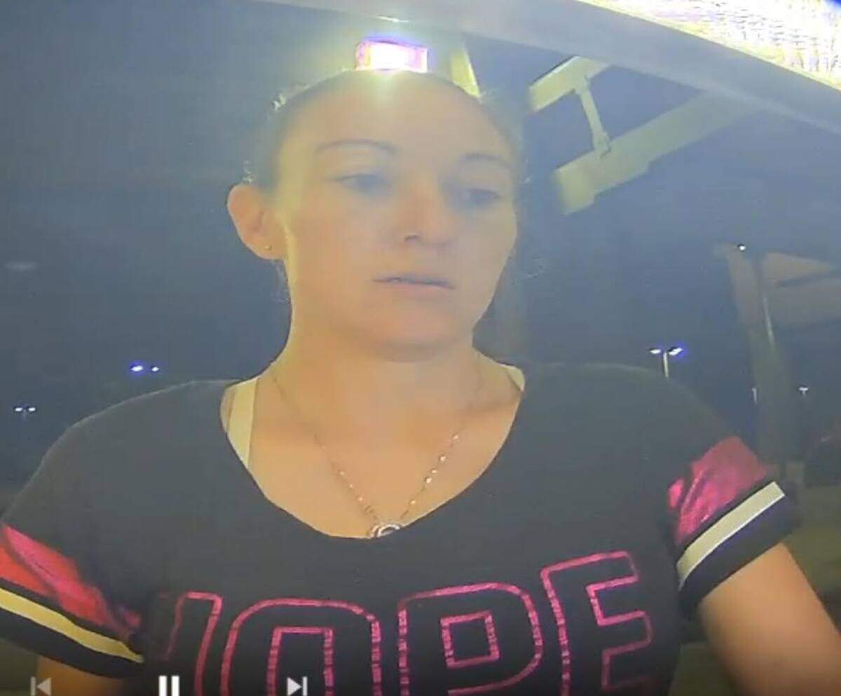 A woman suspected of stealing someone’s identity and using it open bank accounts and withdraw $20,000 from them.