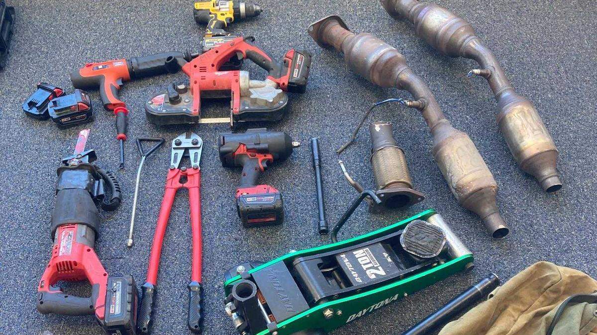 Investigators on Wednesday April 26, 2023, confiscated stolen guns, cash and suspected burglary tools at the home of a man suspected of stealing catalytic converters from vehicles at the Sacramento International Airport.