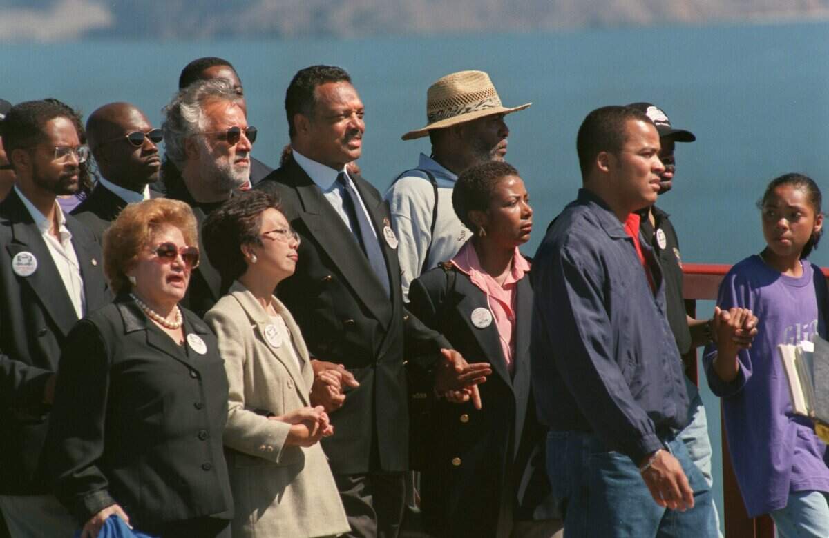 The Rev. Jesse Jackson leads a march against Proposition 209 across the Golden Gate Bridge on Aug. 28, 1997, on the anniversary of Martin Luther King’s I have a Dream speech in Washington, D.C.