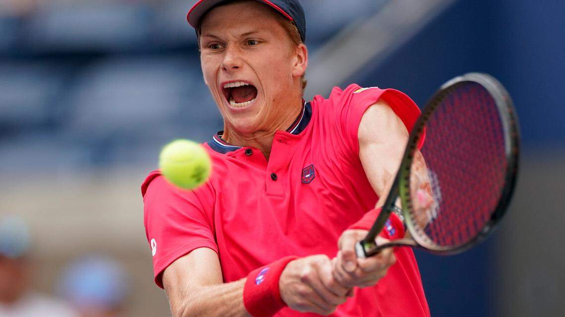 Jenson Brooksby returns a shot to Carlos Alvarez during the third round of the U.S. Open on Saturday, Sept. 3, 2022, in New York.