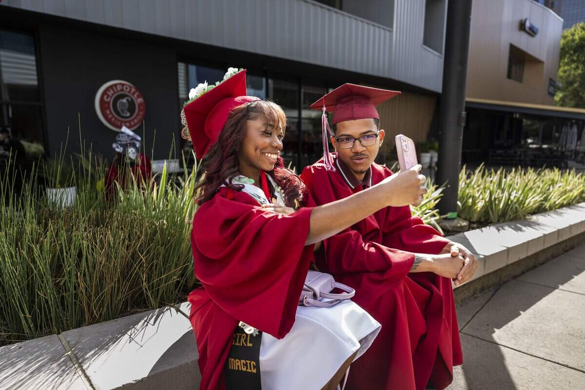 Alyze Hodges and Terrance Newman, both C.K. McClatchy High School graduates, wait to enter their graduation ceremony at Golden 1 Center on Monday, June 8, 2026.