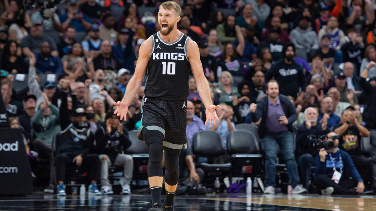 Sacramento Kings forward Domantas Sabonis (10) after getting the assist to Sacramento Kings guard Malik Monk (0) against the Memphis Grizzlies during the third quarter of the NBA basketball game Thursday, Oct. 27, 2022, at Golden 1 Center in Sacramento. The Grizzlies won 125-110.