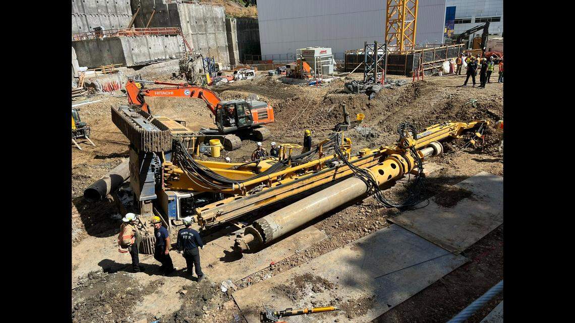 The operator of a 100,000-pound rotary drilling rig was seriously injured after the machine tipped, pinning the worker inside, Oregon officials said. (Photo from Portland Fire and Rescue Bureau)