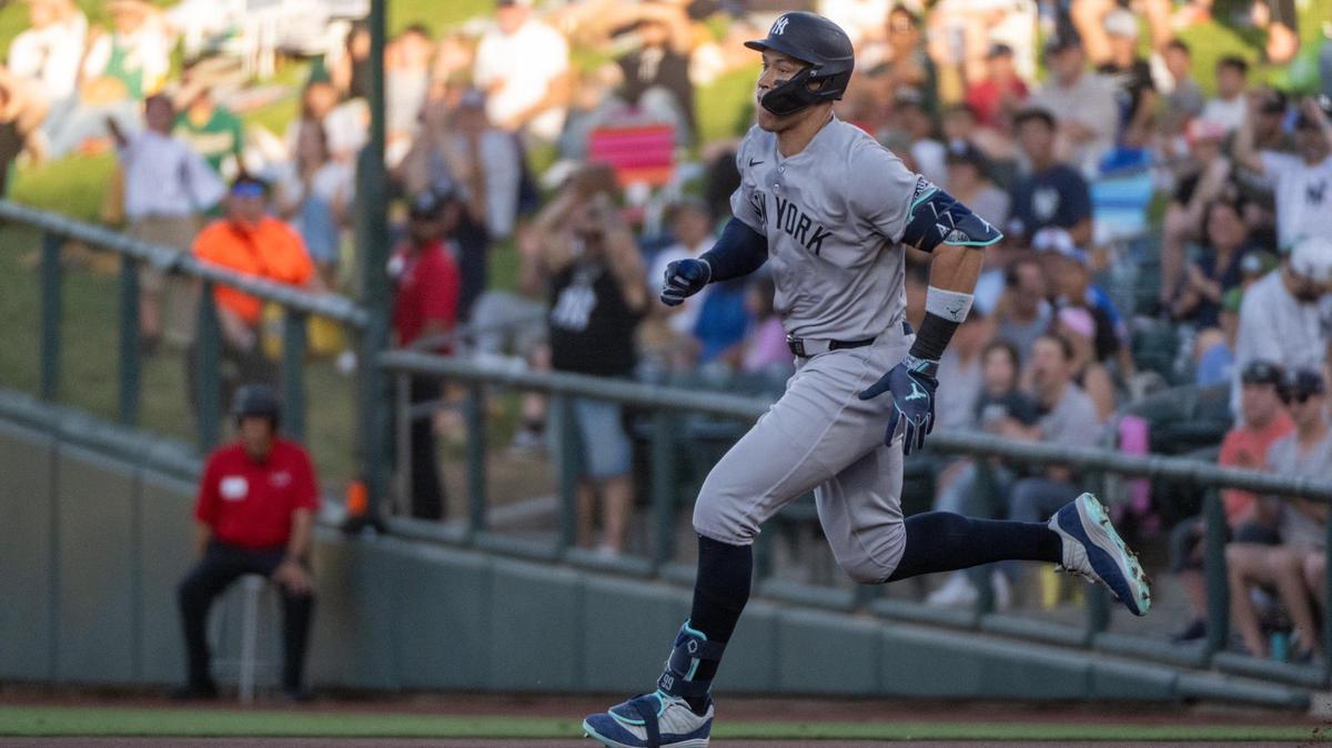New York Yankees outfielder Aaron Judge runs to second base after hitting a double in the first inning against the Athletics at Sutter Health Park on Friday in West Sacramento.