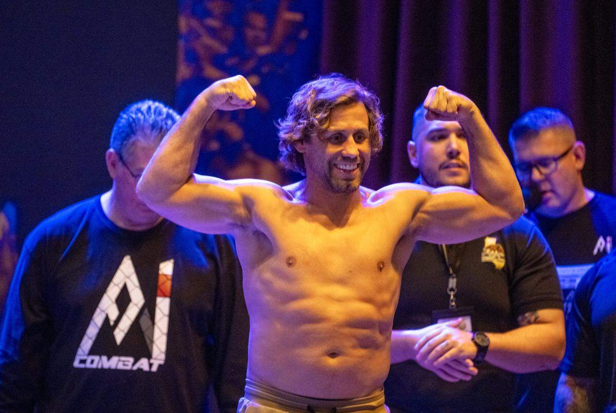 Urijah Faber participates in a ceremonial weigh-in at Hard Rock Hotel & Casino Sacramento at Fire Mountain on Thursday.