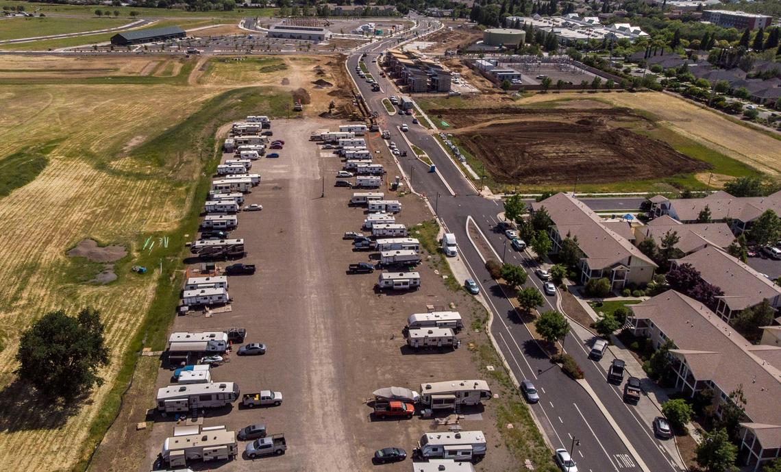Motorhomes are parked in a vacant lot on Notre Dame Boulevard on Tuesday, May 7, 2019, in Chico. The Camp Fire created a housing crisis in the city after many people from Paradise and surrounding communities relocated.