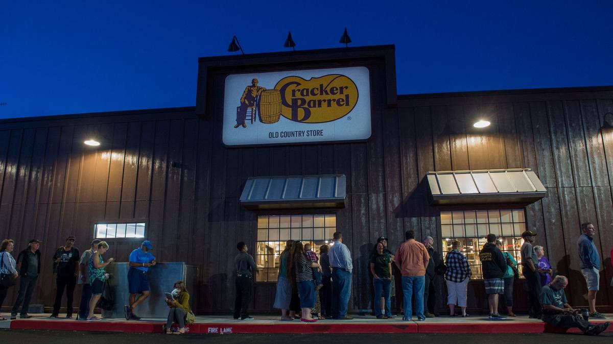 Customers wait in line early Monday, Aug. 20, 2018 for the grand opening of Cracker Barrel in Arden Arcade, which closed in April.