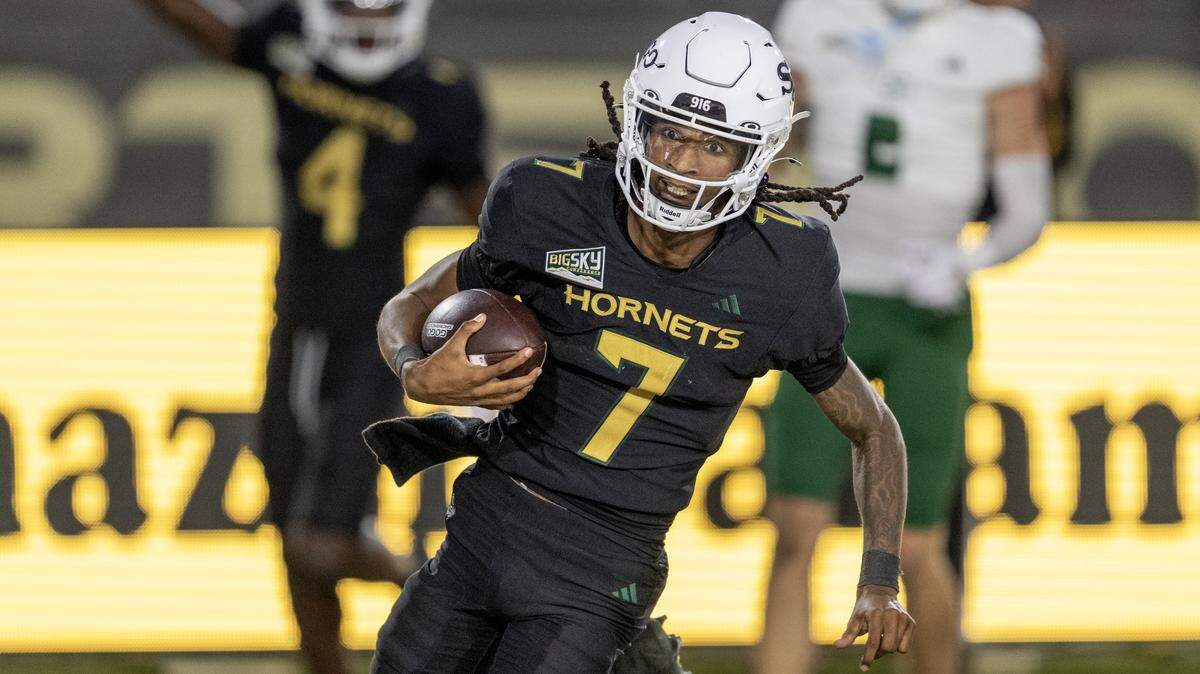 Sacramento State Hornets quarterback Cardell Williams, seen running against the Cal Poly Mustangs defense Sept. 27 in Sacramento, rushed for 139 yards and three touchdowns Saturday against Weber State in Ogden, Utah.