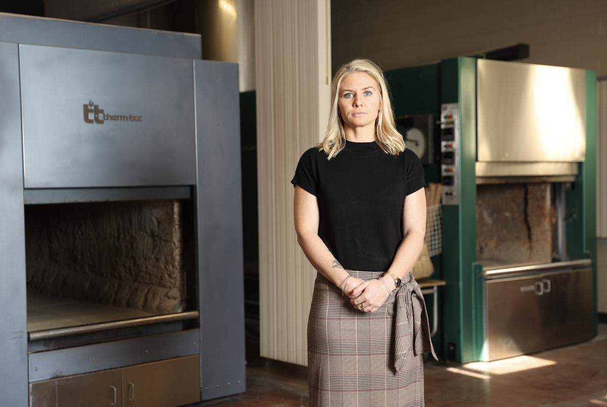 Emily Hughes poses for a portrait in the crematory of Springer and Son Funeral Home in Oregon last month. Hughes, who had a two-year affair with Assemblymember Heath Flora, once worked as a lobbyist for the California Medical Association but felt she was blacklisted after it became public.