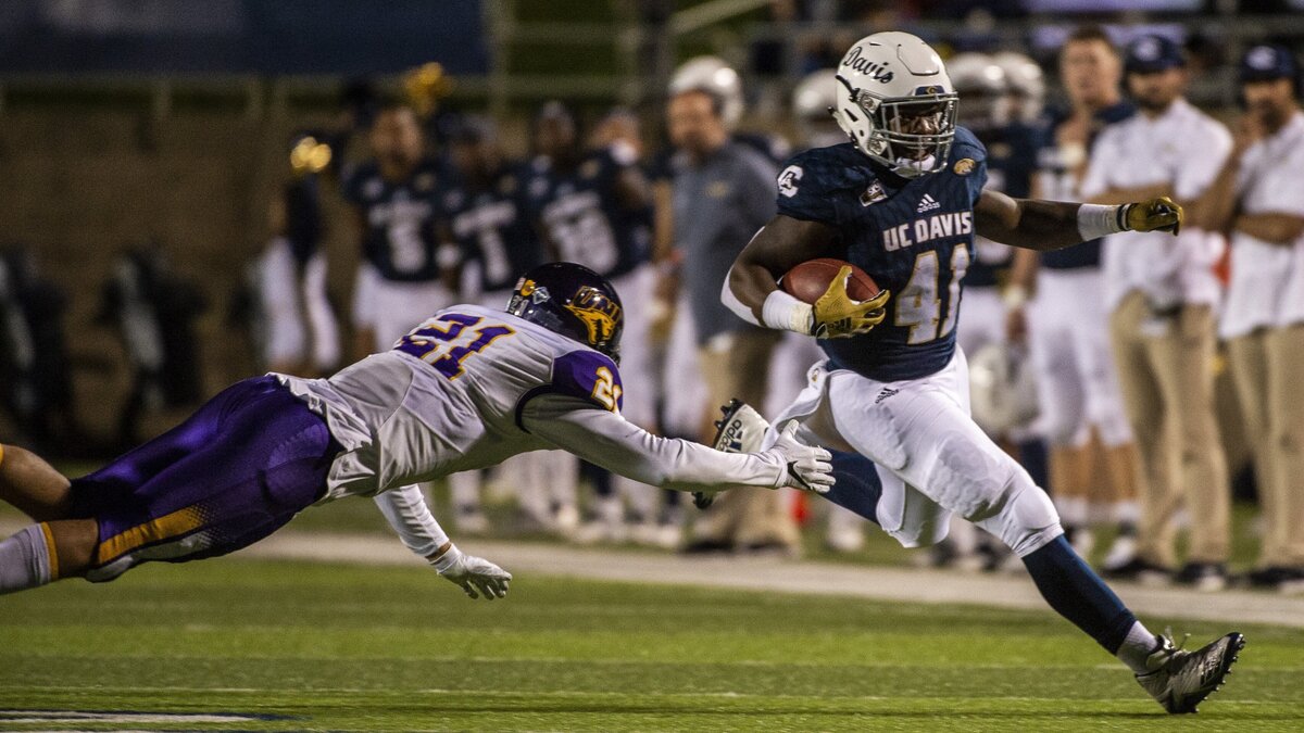 UC Davis Aggies running back Tehran Thomas (41) runs the ball 13 yards during the second quarter during a game between the UC Davis Aggies and the Northern Iowa Panthers at the Aggie Stadium at UC Davis, Saturday, December 1, 2018.