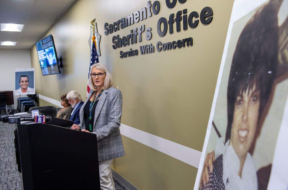 Retired Detective Micky Links speaks during a press conference at the Sacramento County Sheriff’s Office on Wednesday to announce the solving of the 1970 cold case murder of Nancy Bennallack, pictured at right.