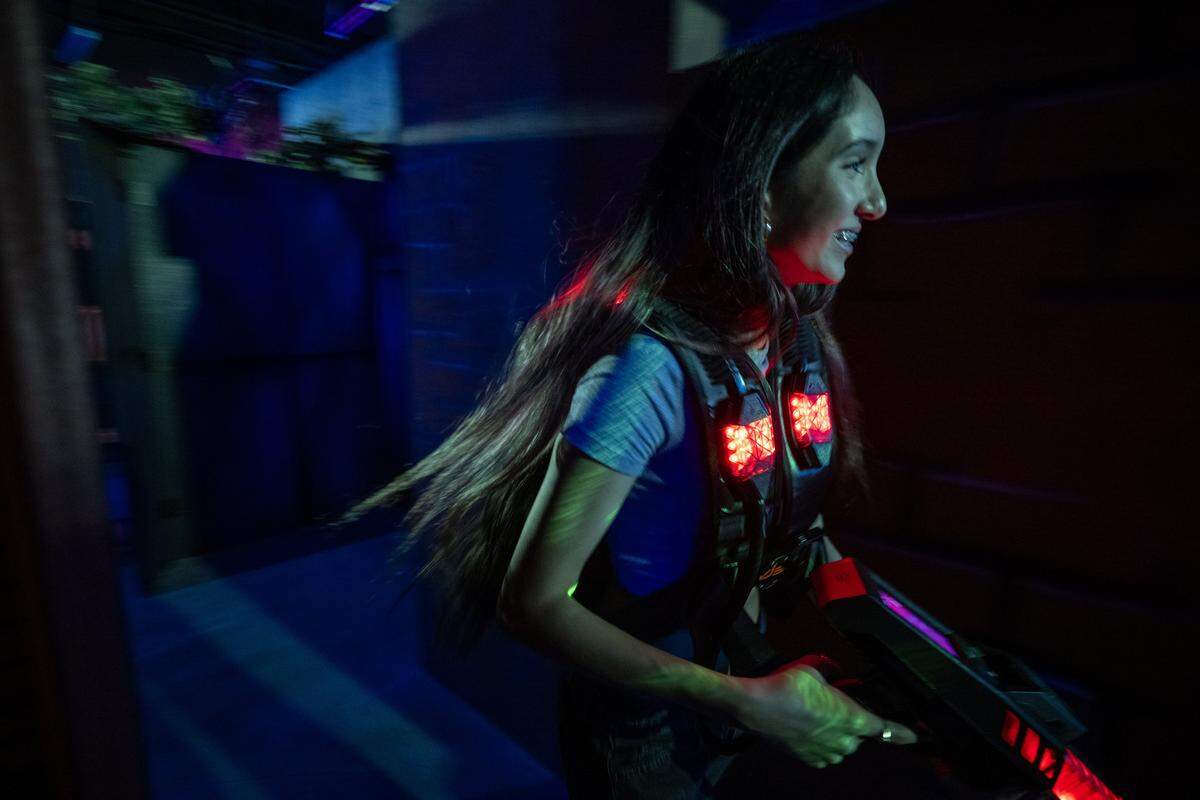 Juli Maurizio plays laser tag at the BLVD in West Sacramento on Wednesday, Aug. 6, 2025.