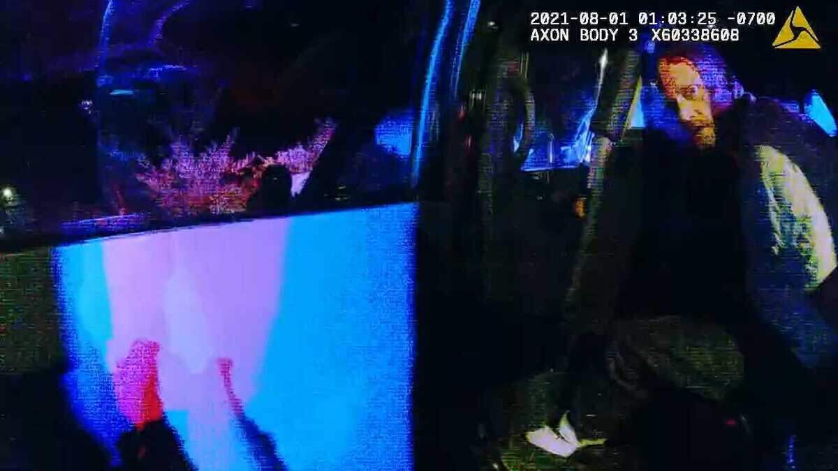 In an image taken from sheriff’s body-worn video, Larry Weigle is seen handcuffed in a patrol vehicle following his arrest on Aug. 1, 2021. During the effort to restrain Weigle, who had run from police, a deputy stomped Weigle twice, causing the suspect to scream in pain. Weigle is now suing the Sheriff’s Office as part of a federal civil rights lawsuit.