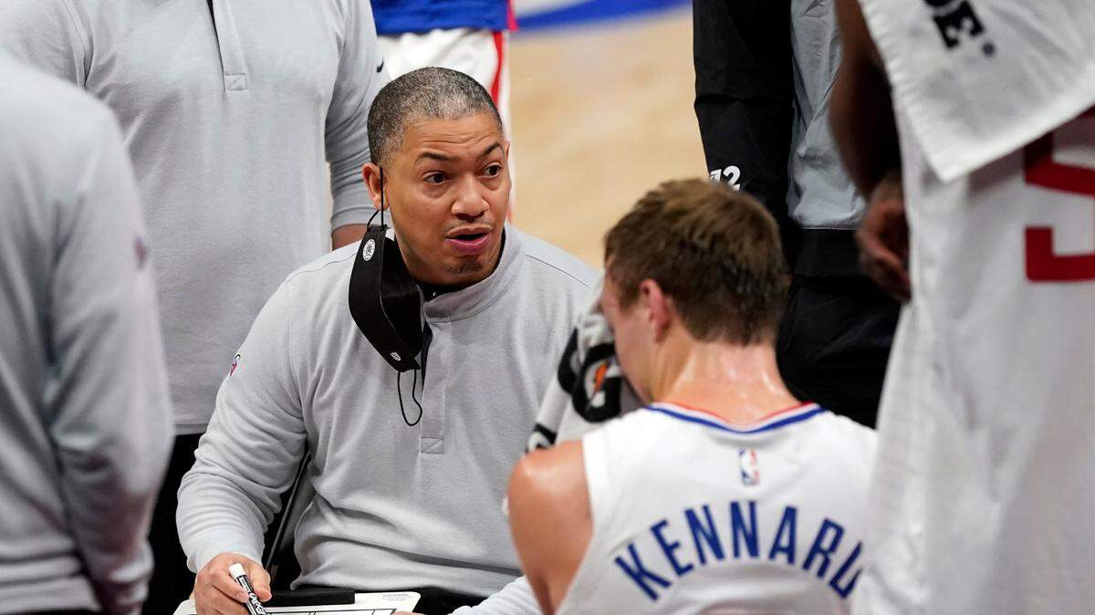 Los Angeles Clippers head coach Tyronn Lue talks to the team during a timeout in the first half of an NBA basketball game against the Detroit Pistons, Wednesday, April 14, 2021, in Detroit. (AP Photo/Carlos Osorio)