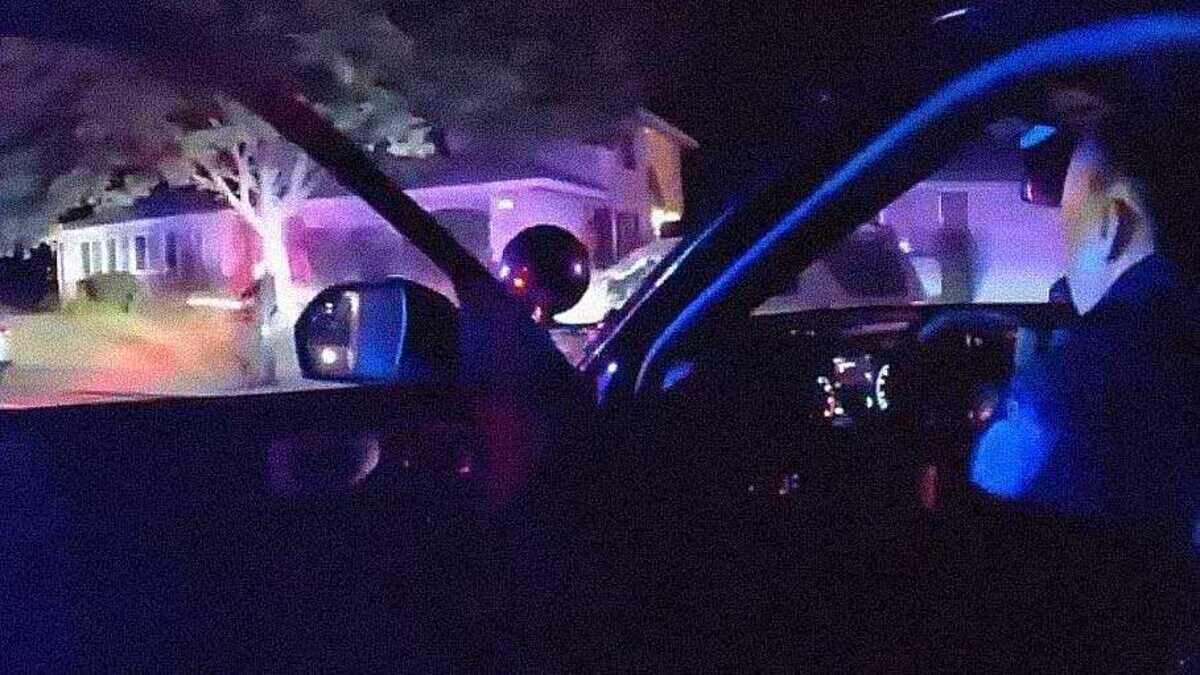 In an image taken from body-worn camera video, a man wielding a 25-inch sword is seen waiving the weapon before being shot by Sacramento police on July 14, 2025. The man remains in critical condition at a hospital as police continue their use-of-force investigation.
