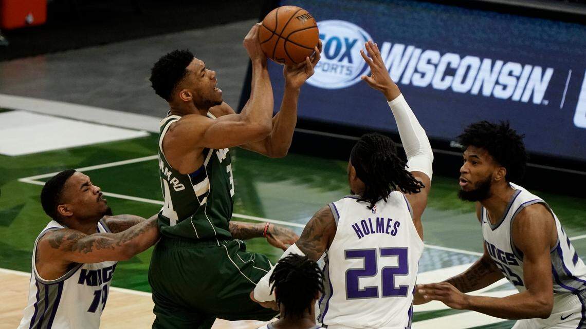 Milwaukee Bucks’ Giannis Antetokounmpo shoots during the first half of an NBA basketball game against the Sacramento Kings Sunday, Feb. 21, 2021, in Milwaukee. (AP Photo/Morry Gash)