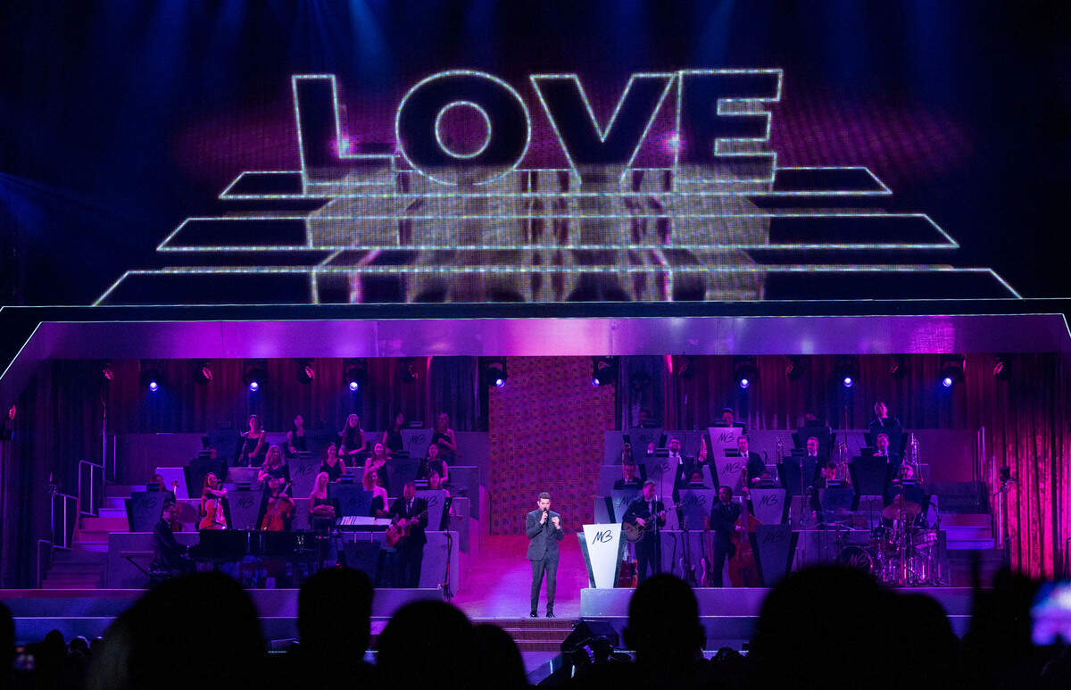The word “love” looms over the stage as Michael Bublé performs his Higher Tour at Golden 1 Center in Sacramento on Saturday.