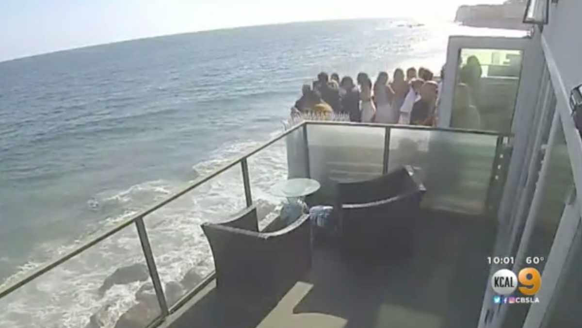 Officials said there were as many as 15 people on the balcony when it collapsed to the rocky beach below.